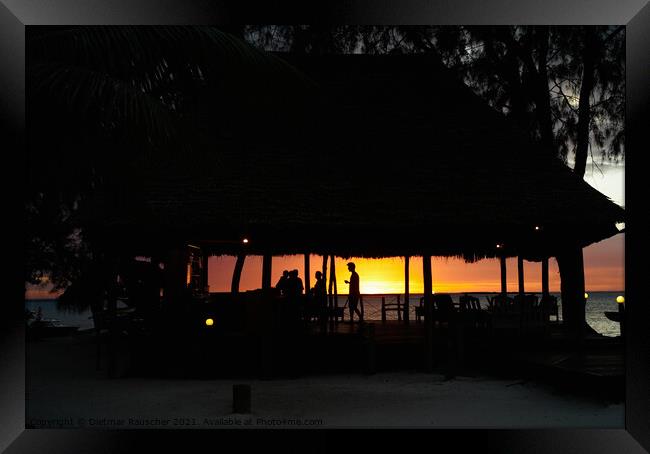 Silhouette of a Beach Bar against a Romantic Sunset Framed Print by Dietmar Rauscher