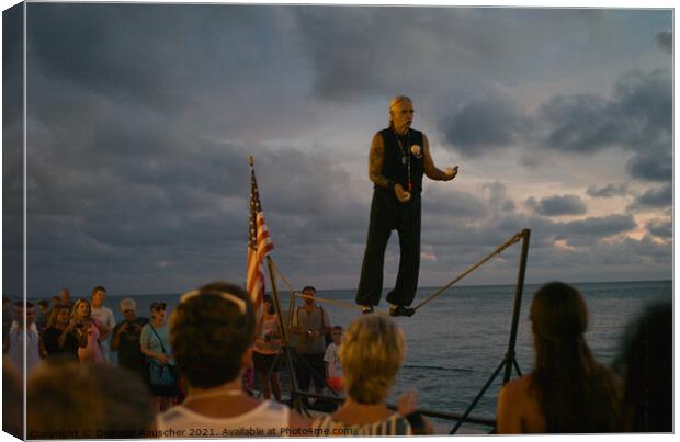 Man on a tightrope juggling in Key West, Florida Canvas Print by Dietmar Rauscher