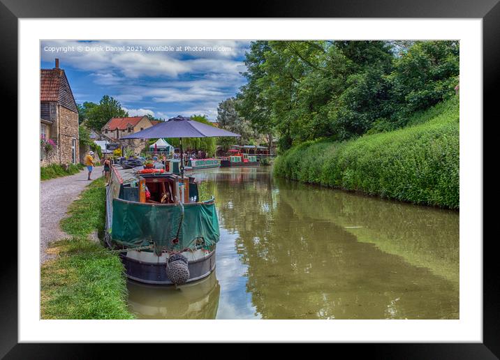 Narrowboats Reflecting In The Canal Framed Mounted Print by Derek Daniel