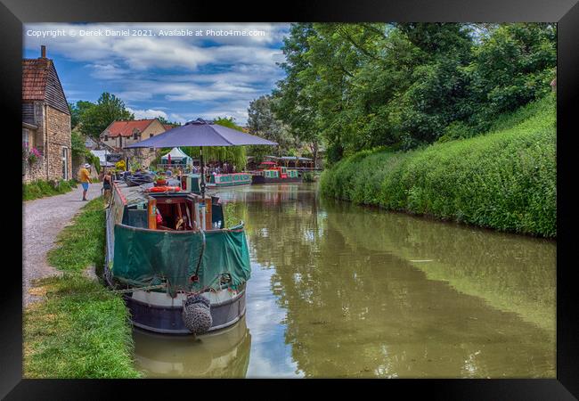 Narrowboats Reflecting In The Canal Framed Print by Derek Daniel