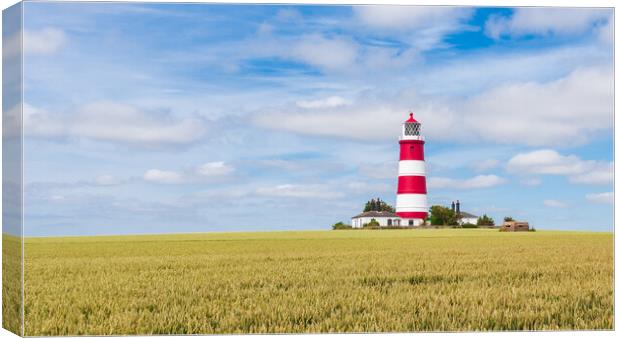 Majestic Happisburgh Lighthouse Canvas Print by Kevin Snelling
