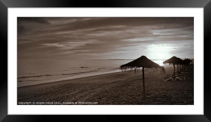 Sunset and umbrellas in Garrao - Algarve Framed Mounted Print by Angelo DeVal