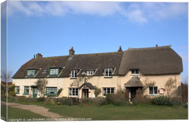 Charming Porlock Fishermens Cottages Canvas Print by Les Schofield