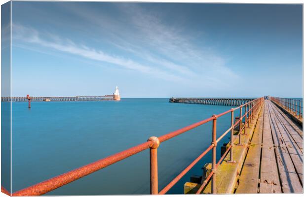 The Piers at Blyth Canvas Print by Mark Jones