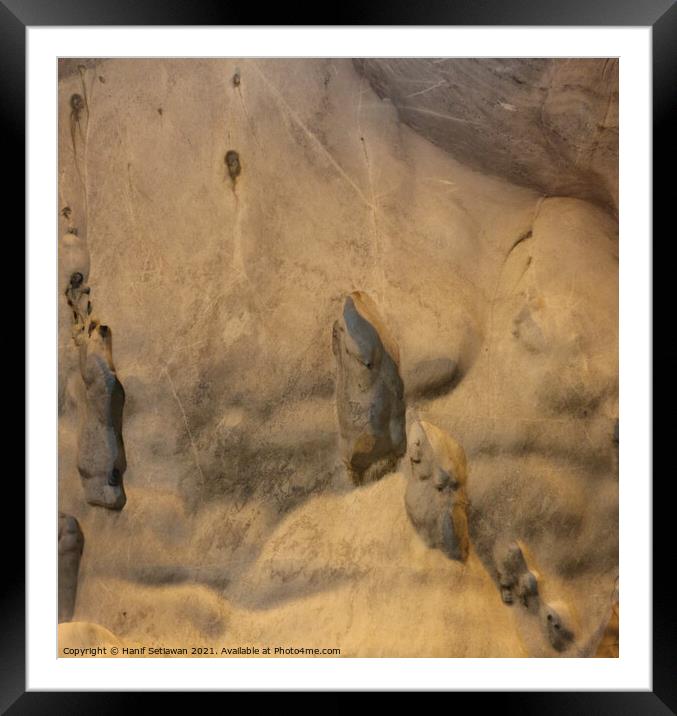 Gnomes or trolls on creme white cave wall. Framed Mounted Print by Hanif Setiawan