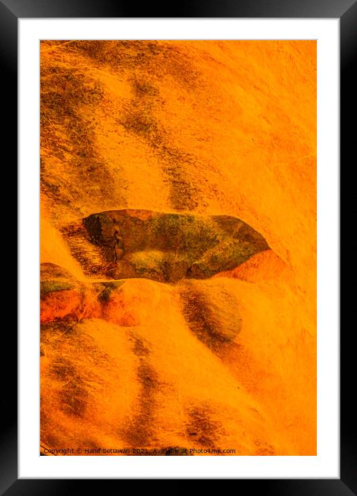 Cave painting on orange cave wall. Framed Mounted Print by Hanif Setiawan