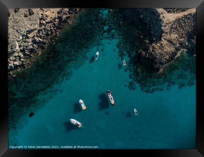 Blue Lagoon in Cape Greco Framed Print by Fanis Zerzelides