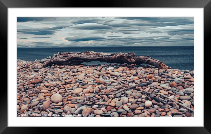 pebbles and woods Framed Mounted Print by Ralph Greig