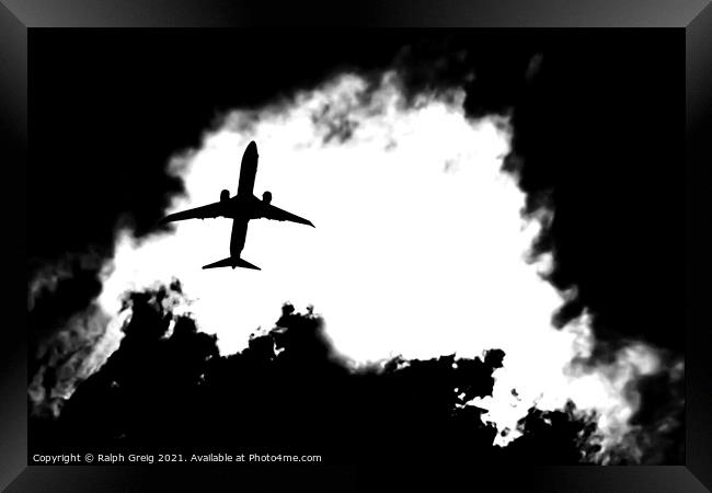 Shadow of a plane Framed Print by Ralph Greig