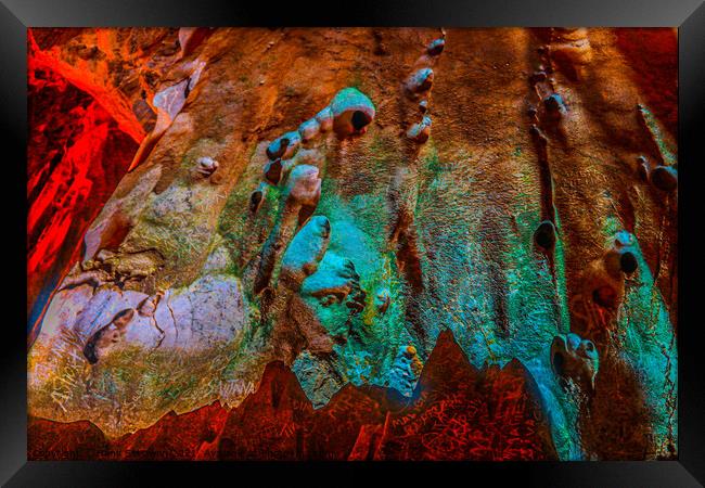 Abstract shapes on a flowing stone wall in a cave Framed Print by Hanif Setiawan