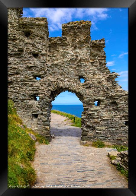 Tintagel Castle in Cornwall, UK Framed Print by Chris Dorney