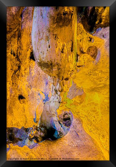 A gnome below a stalactite Framed Print by Hanif Setiawan