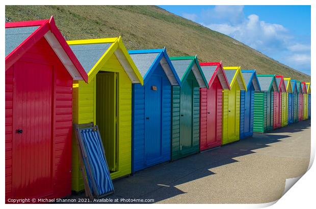 Row of Beach Huts at Whitby Print by Michael Shannon