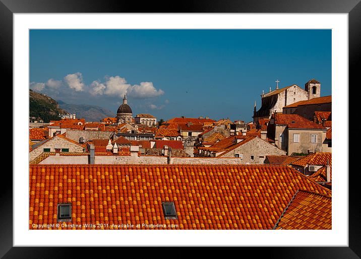 Red Roofs, Blue Skies Framed Mounted Print by Christine Johnson