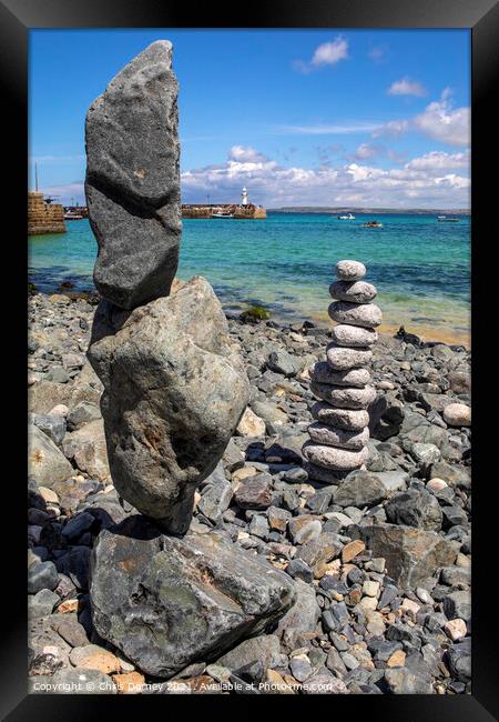 Rock Balancing at St. Ives in Cornwall, UK Framed Print by Chris Dorney