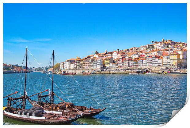 Famous colorful boats providing tours along banks of Rio Douro Print by Elijah Lovkoff