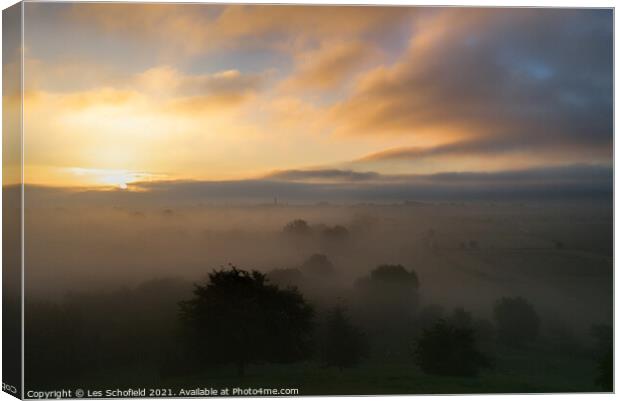 Misty Sunrise on The Somerset Levels  Canvas Print by Les Schofield
