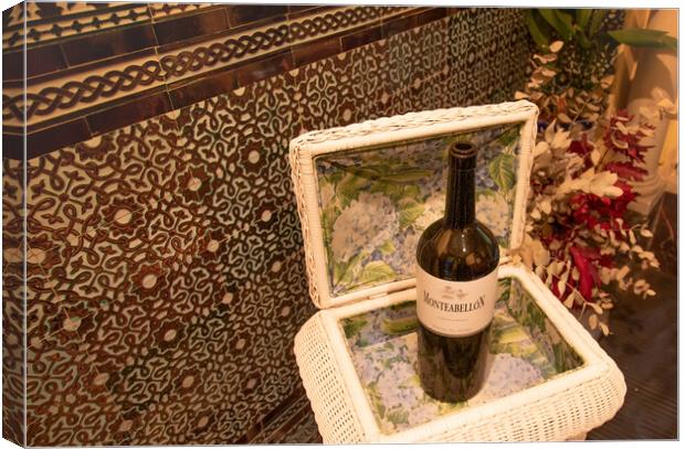 Bottle of Spanish Wine on the display in historic city center of Cordoba, Andalucia Canvas Print by Elijah Lovkoff