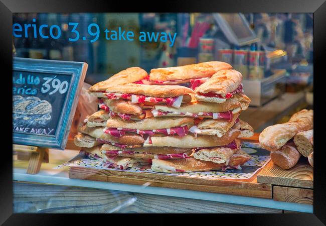 Famous Spanish jamon sandwich sold at the streets of Granada his Framed Print by Elijah Lovkoff