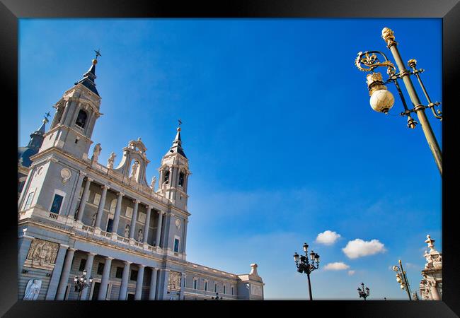 Madrid, Famous Almudena Cathedral on a bright sunny day Framed Print by Elijah Lovkoff