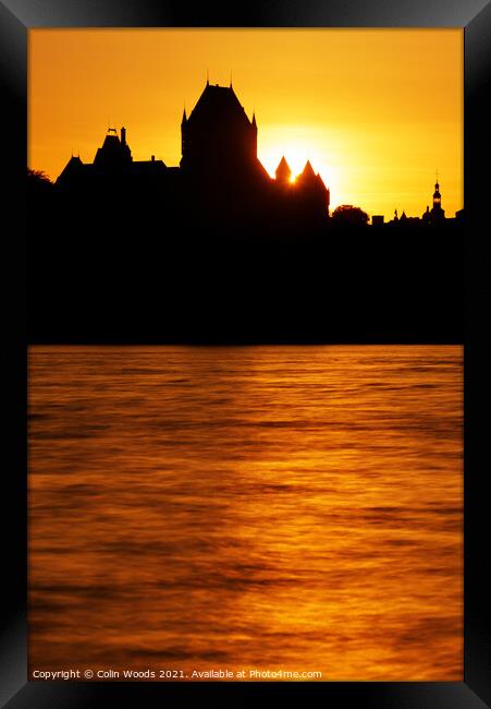 The Chateau Frontenac silhouetted against the sunset Framed Print by Colin Woods
