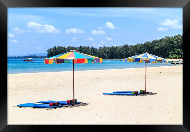 Umbrellas and beach mats on Nai Yang beach, Phuket, Thailand Framed Print by Kevin Hellon