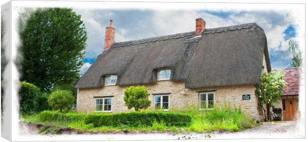 Thatched Cottage, Cotswolds. Canvas Print by Graham Lathbury