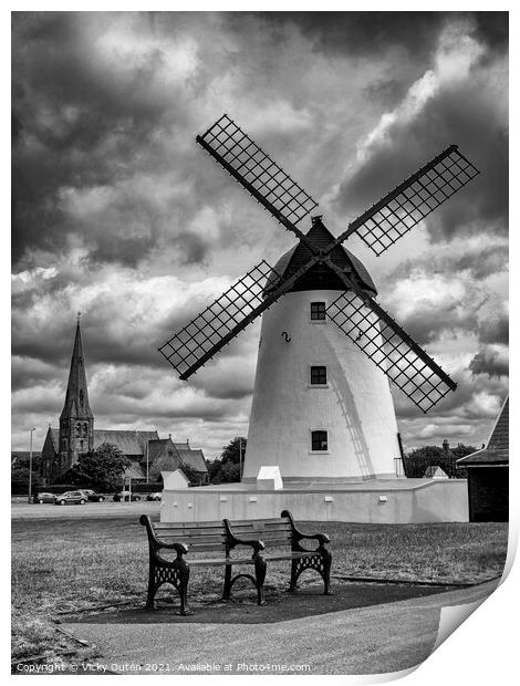 Lytham Windmill on cloudy day Print by Vicky Outen