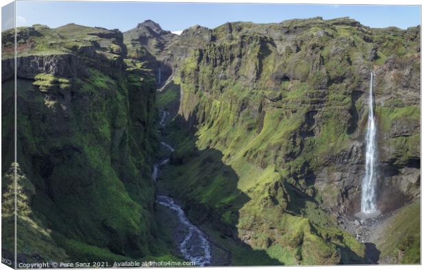 Stunning View of Secret Canyon with Double Waterfall in Iceland  Canvas Print by Pere Sanz
