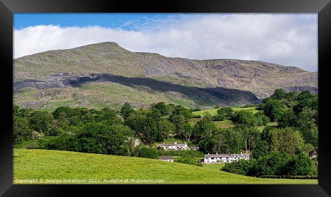 Early morning light on the village of Coniston & the 'Old Man'  Framed Print by George Robertson
