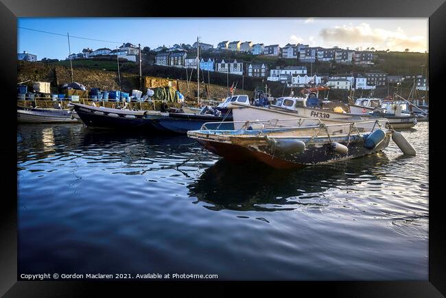 Boats moored in Mevagissey Harbour, Cornwall. Framed Print by Gordon Maclaren