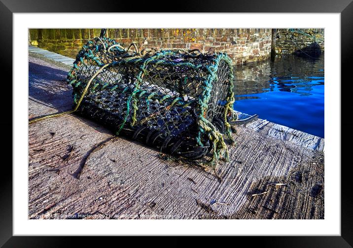 Lobster pot on the quay in Mevagissey Harbour Framed Mounted Print by Gordon Maclaren