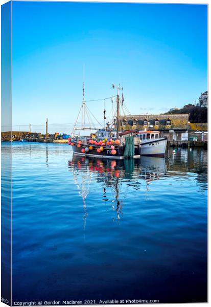 Fishing boats in Mevagissey Harbour, Cornwall. Canvas Print by Gordon Maclaren
