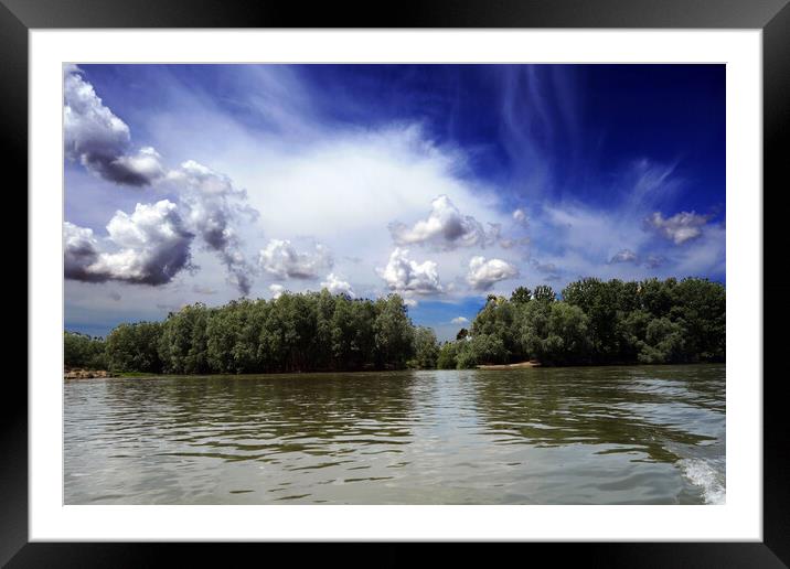 The journey of the clouds over the Borcea arm  Framed Mounted Print by liviu iordache