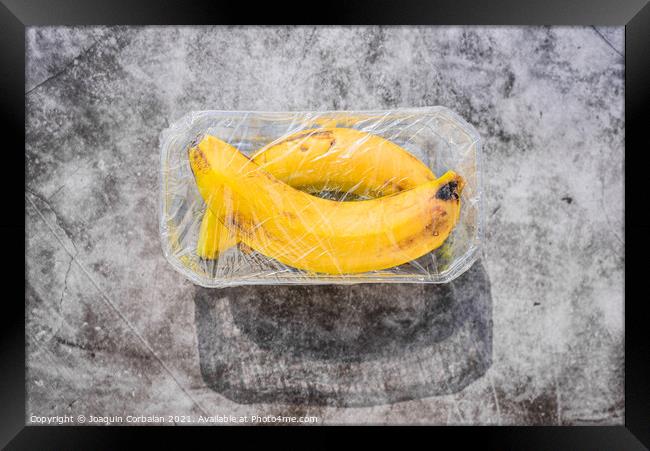Plastic waste is unsustainable, polluting unnecessary fruit wrap Framed Print by Joaquin Corbalan