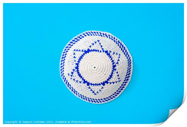 Kippah is a circular hat, with the flag of Israel, isolated on a Print by Joaquin Corbalan