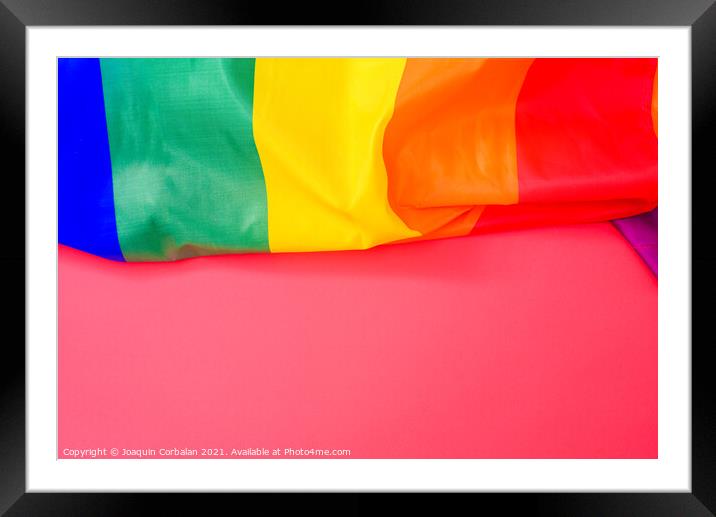 Red background with space for text, with the rainbow flag of the Framed Mounted Print by Joaquin Corbalan