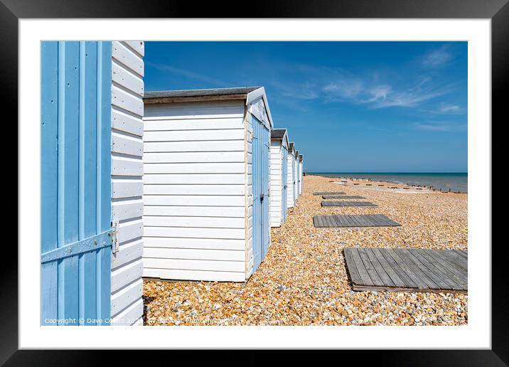 Beach Huts and the Coast at Bexhill in East Sussex Framed Mounted Print by Dave Collins