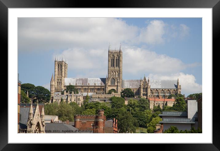 Lincoln Cathedral over the roof tops Framed Mounted Print by Clive Wells