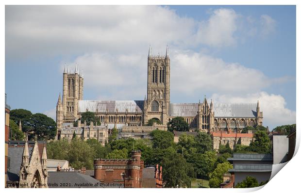 Lincoln Cathedral over the roof tops Print by Clive Wells