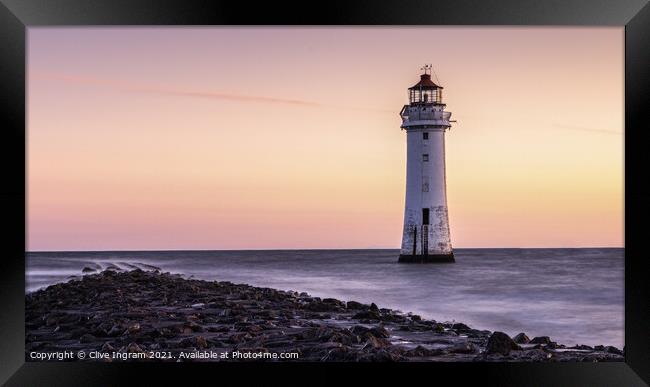 Serene Sunrise at Perch Rock Lighthouse Framed Print by Clive Ingram