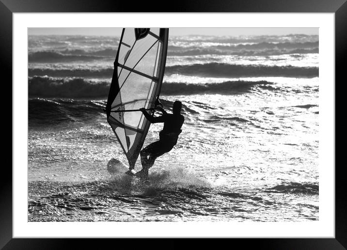 Wind surfer heads out to sea Framed Mounted Print by Paul Lawrenson