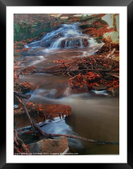 Frozen stream  Framed Mounted Print by Les Schofield