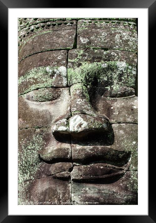 Stone face at Angkor Thom, Cambodia Framed Mounted Print by Ian Miller