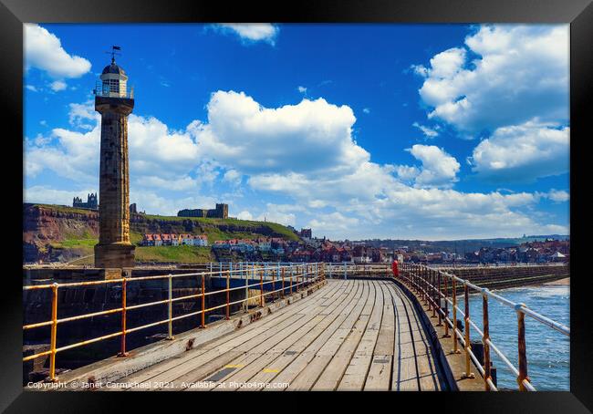 Whitby West Pier Framed Print by Janet Carmichael