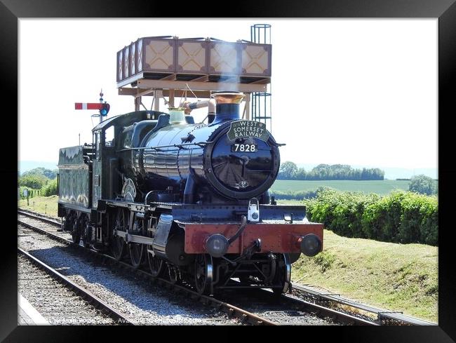 West Somerset Railway steam locomotive ready to move along track Framed Print by Joan Rosie