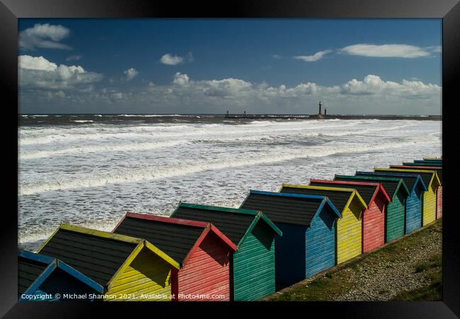Whitby, Beach Huts Framed Print by Michael Shannon