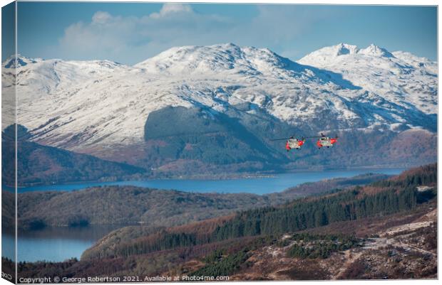 Two Sea Kings flying low over Loch Lomond Canvas Print by George Robertson