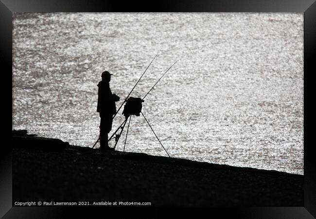 Silhouette of a fisherman Framed Print by Paul Lawrenson