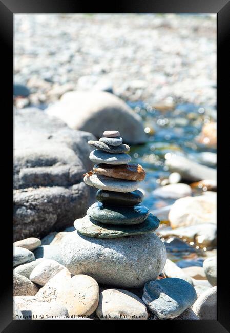 Pebbles Tower And Stream Framed Print by James Lavott